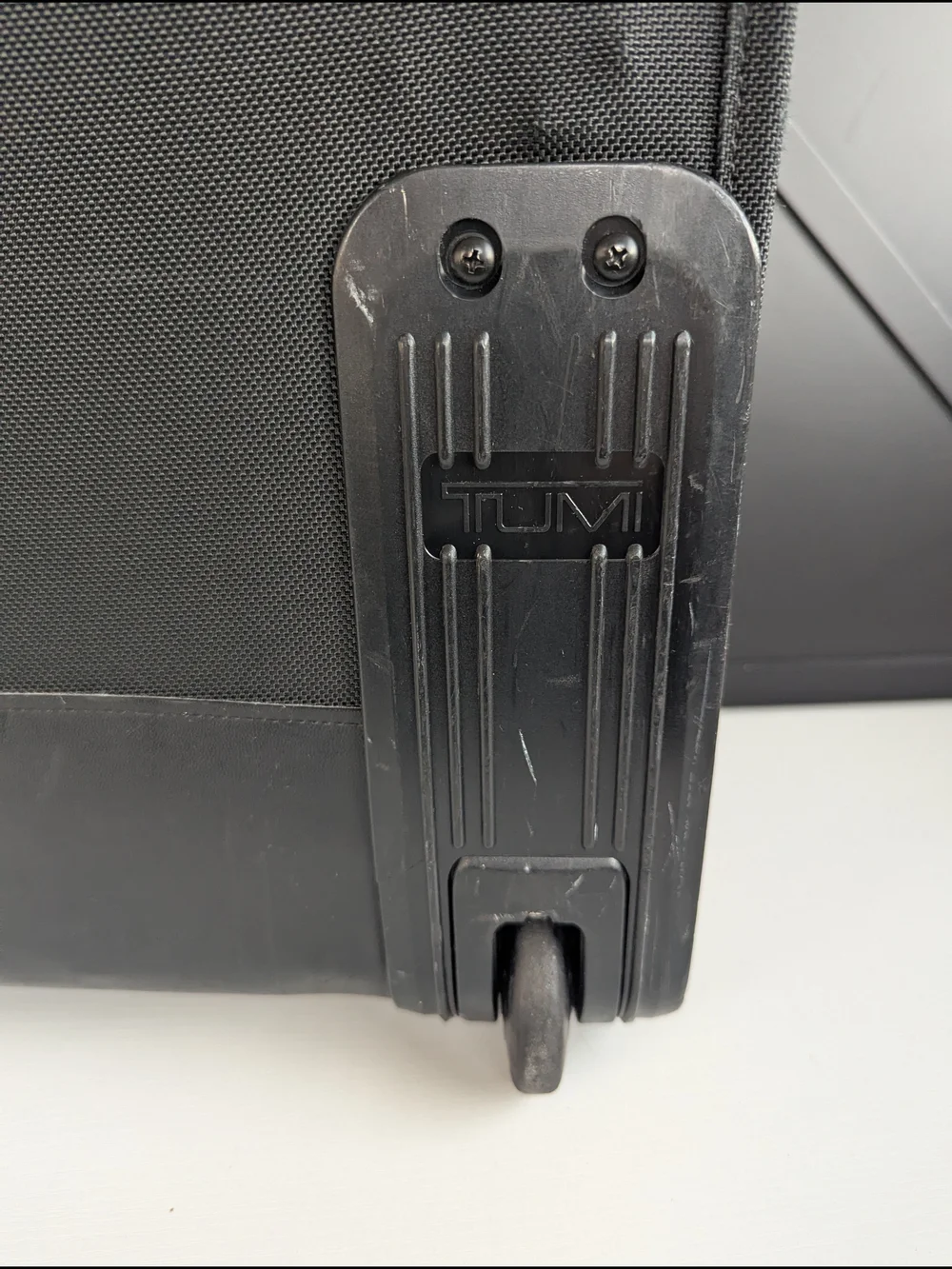 Tumi Black Men’s Carry-On Rolling Travel Bag